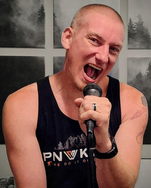 Title Joe Buchmann performing as Ashalo